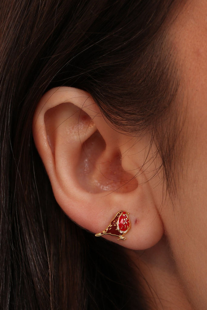 stud earring being worn on the earlobe