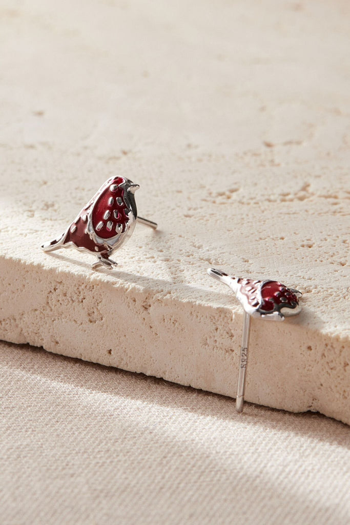 showing the S925 sterling silver stamp on the earring pin