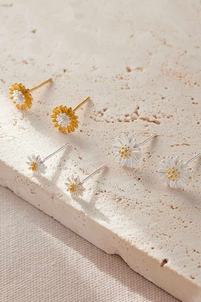 all three styles of earrings, small silver, medium gold and large silver