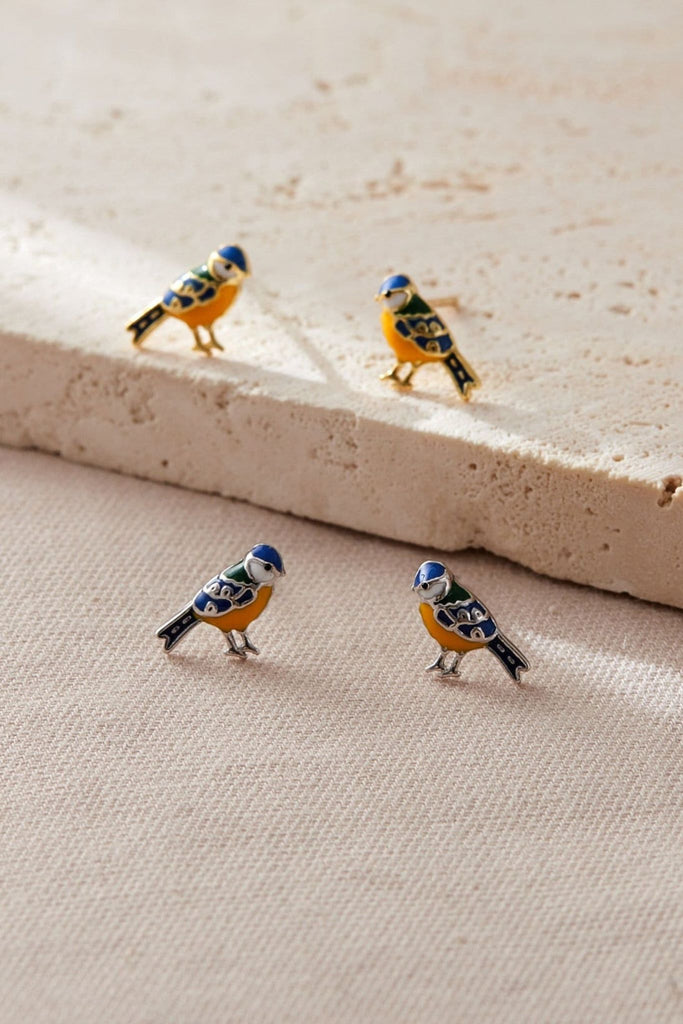 showing both the silver and gold styles of blue tit bird earrings