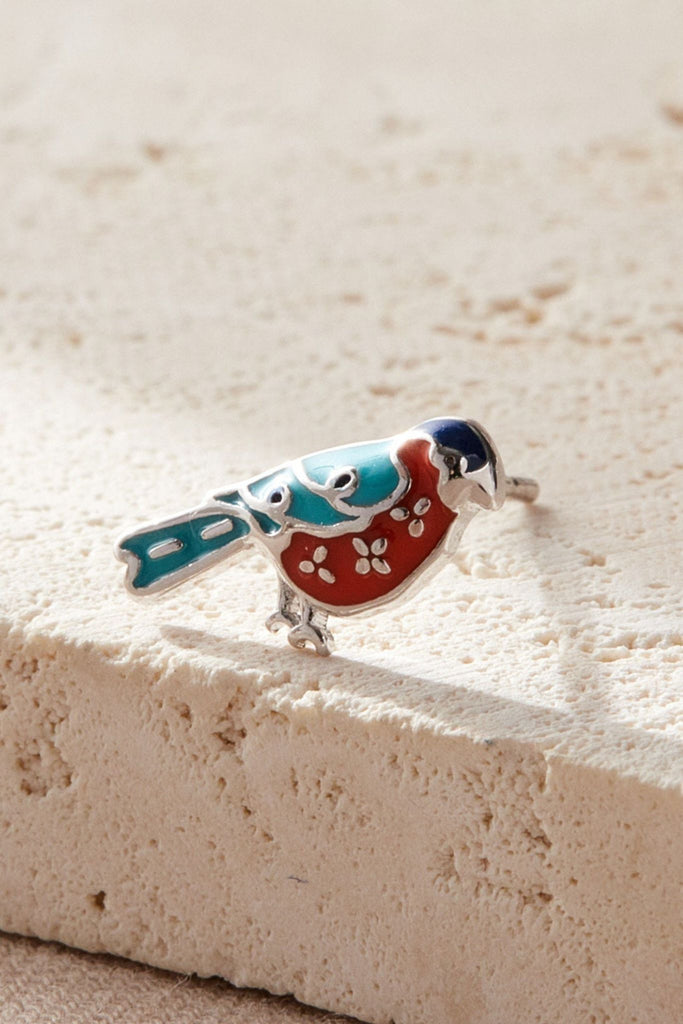 close up of the earrings, showing the patterns on the earrings