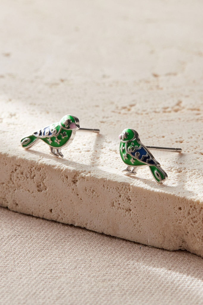 close up of the siiver greenfinch stud earrings