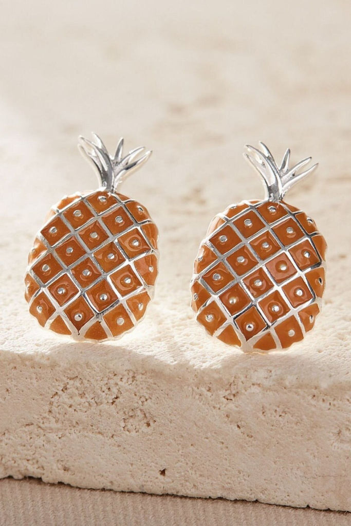 close up of the silver pineapple studs, showing the detail of the design