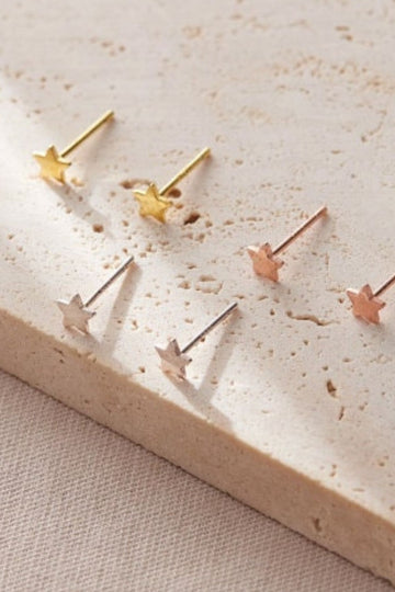 showing all three colours of these star studs earrings, silver, gold and rose gold all made from S925 sterling silver