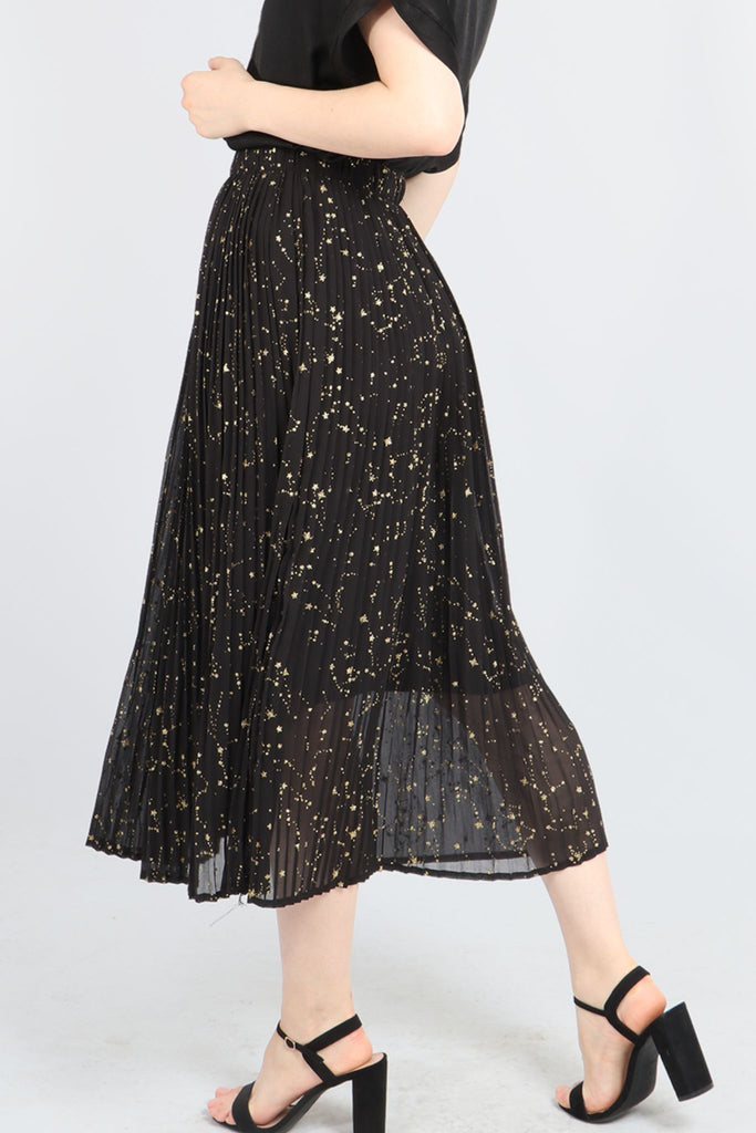 showing a close up of the gold constellation print pattern