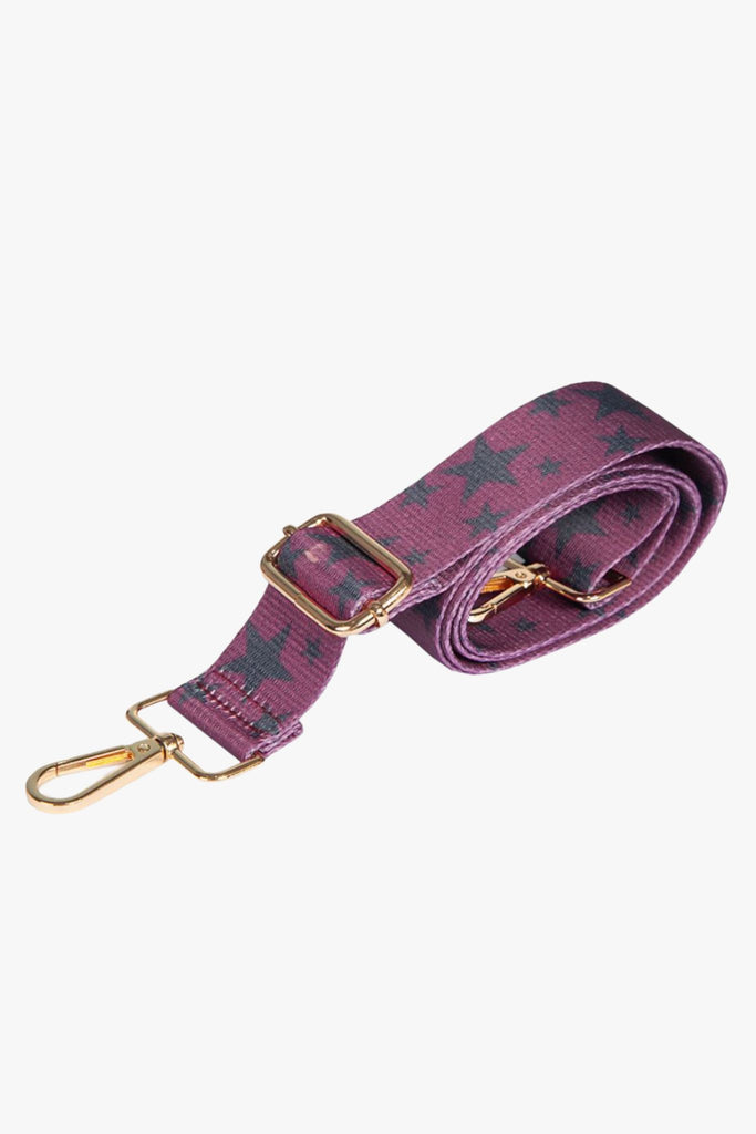 pink and black star print detachable bag strap with gold hardware