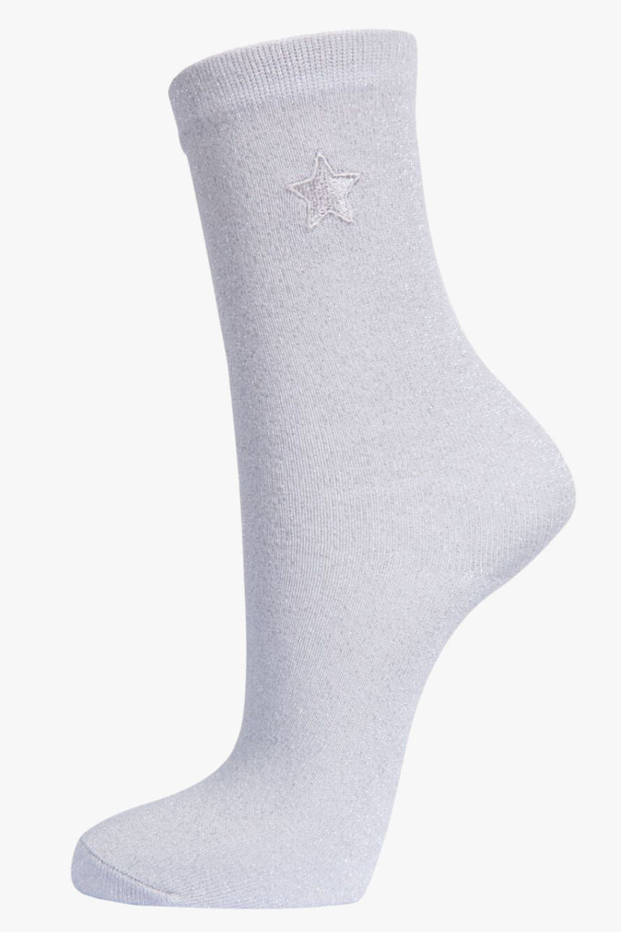 white and silver glitter socks with an embroidered star on the ankle