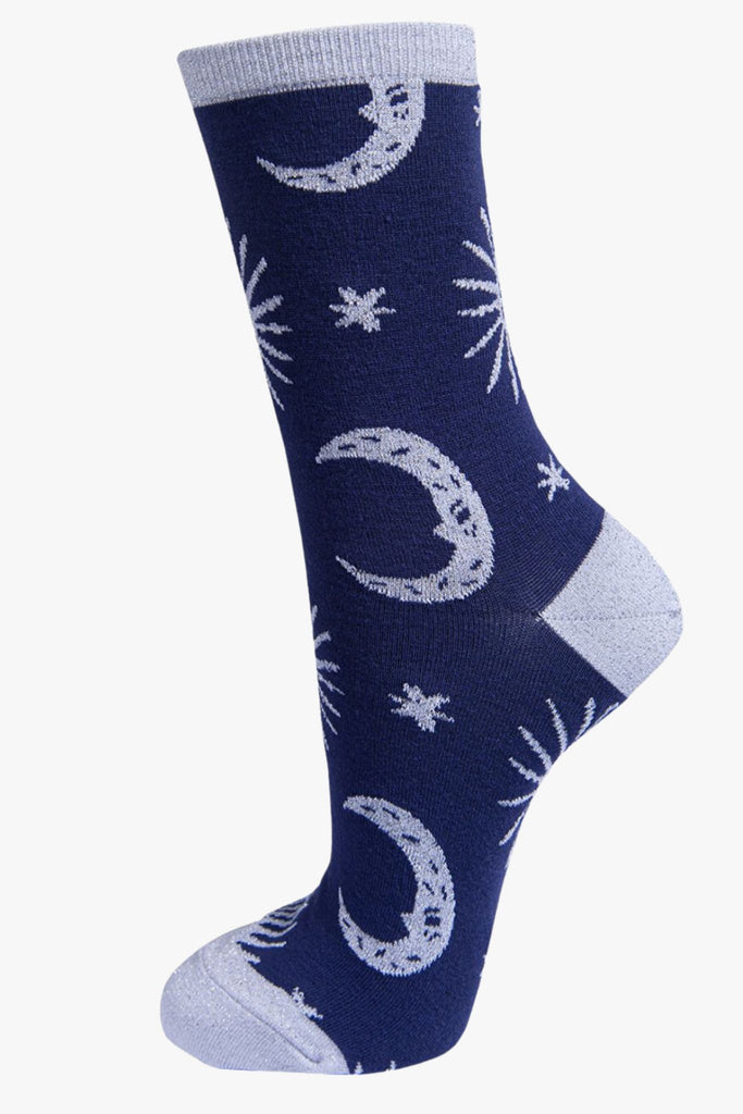 navy blue, silver glitter socks with moons and stars on them