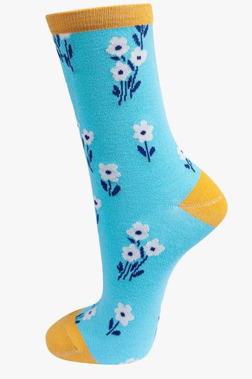 blue and yellow bamboo ankle socks with an all over white ditsy floral print