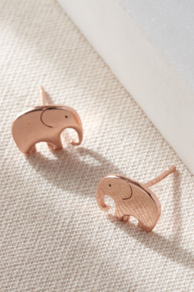 close up of the rose gold elephant earrings