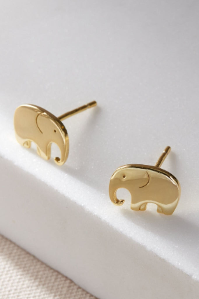 close up of the gold elephant earrings