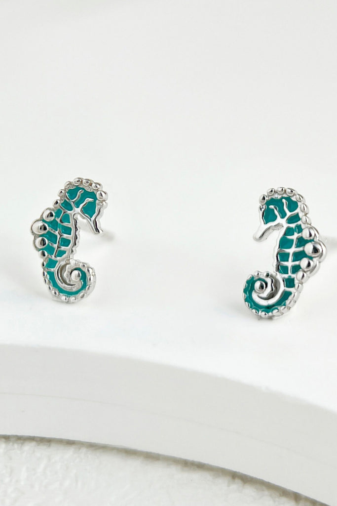 turquoise and silver coloured seahorse stud earrings