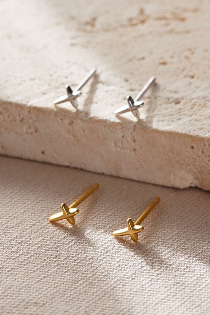 sterling silver tiny cross stud earrings in gold and silver 