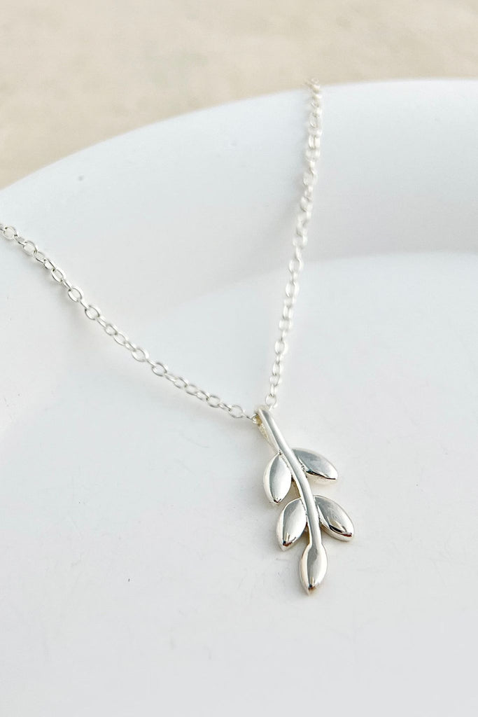 close up of the sterling silver olive leaf pendant