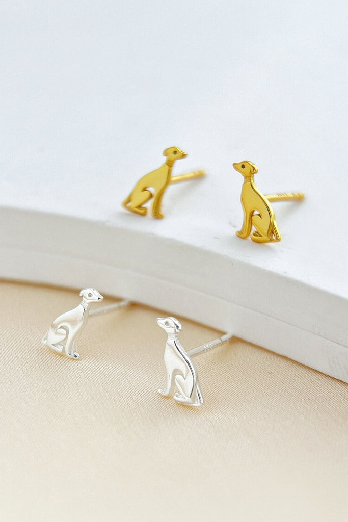 silver and gold coloured greyhound dog stud earrings, the greyhounds are sitting