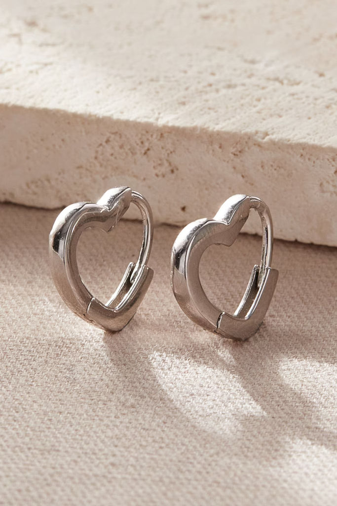 silver heart shaped huggie hoop earrings