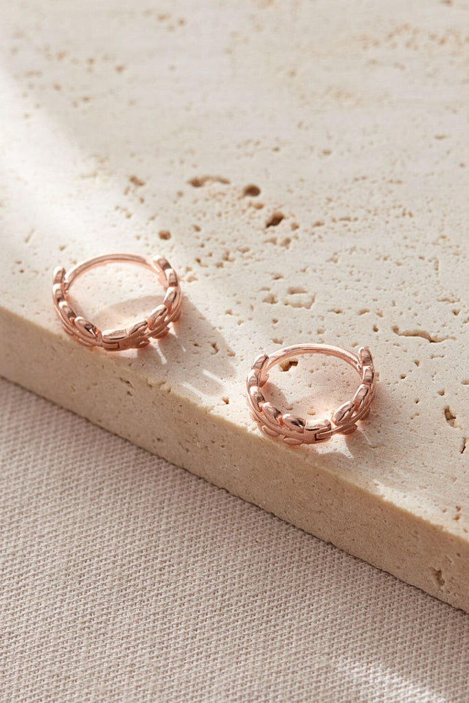 close up of the rose gold plated s925 silver olive hoop earrings
