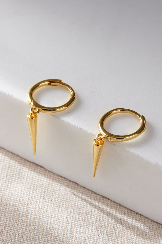 close up of the gold plated s925 sterling silver drop hoop spike earrings