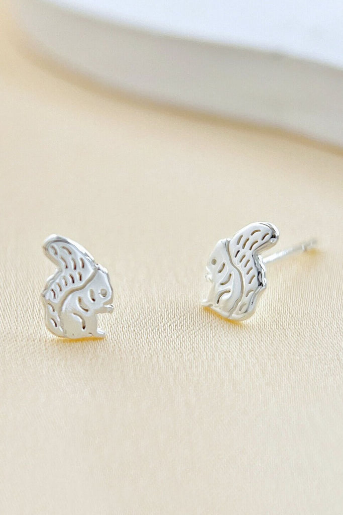 close up of the silver squirrel stud earrings