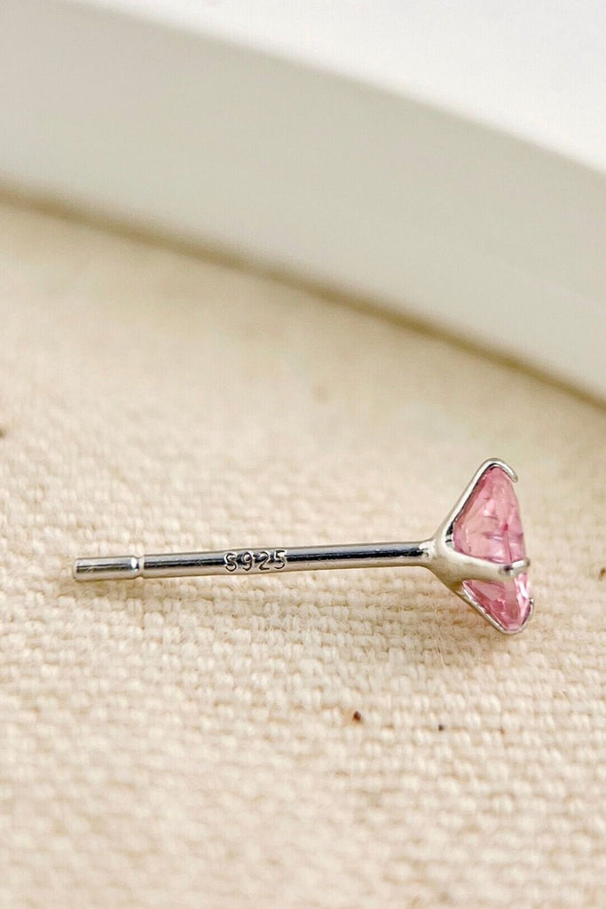 close up of the s925 hallmark on the stem of the earrings