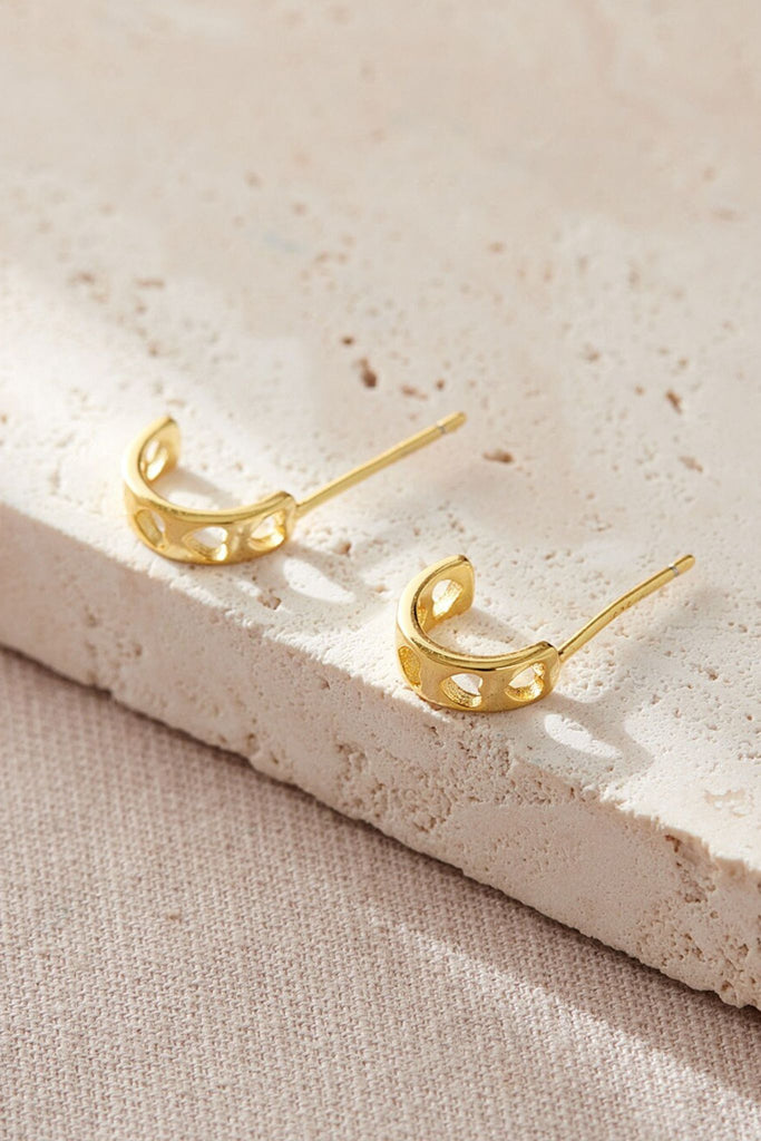 close up of the gold plated silver half hoop earrings