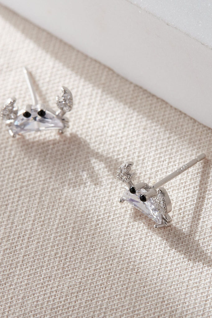 close up of the silver sparkly crab stud earrings