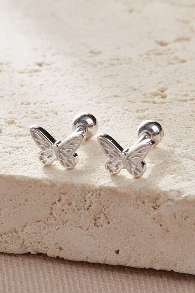 sterling silver cartilage stud earrings, designed to look like butterflies, the studs have a screw back ball fastening