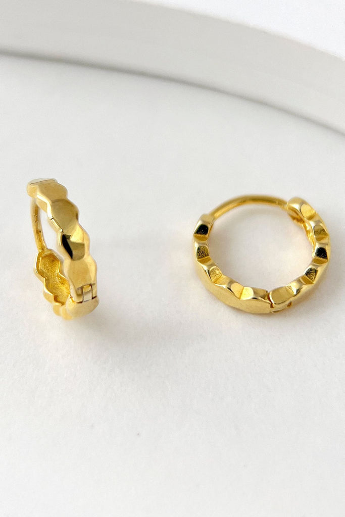 close up of the gold plated silver honeycomb huggie hoop earrings