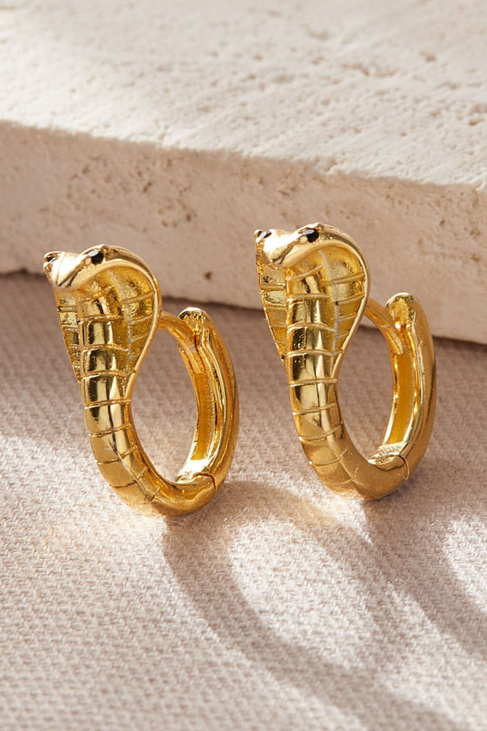 gold huggie hoops designed to look like cobra snakesike king cobras