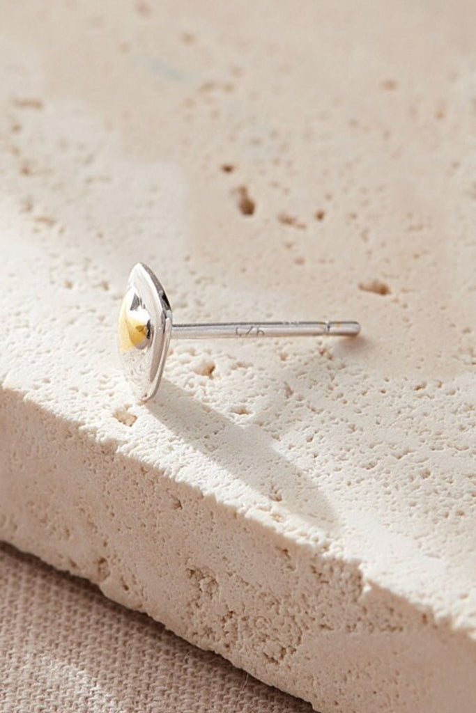 close up of the S925 stamp on the stems of the earrings