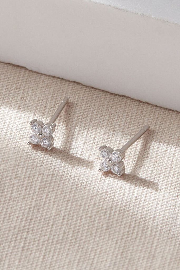 close up of the silver sparkly clover stud earrings