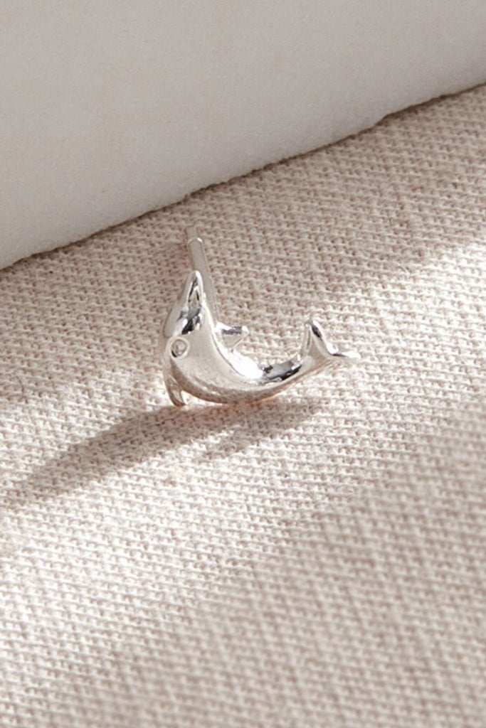 close up of the dolphin earring