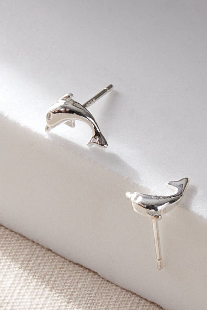 sterling silver dolphin stud earrings, a pair of porpoising dolphins, tiny studs with butterfly backs