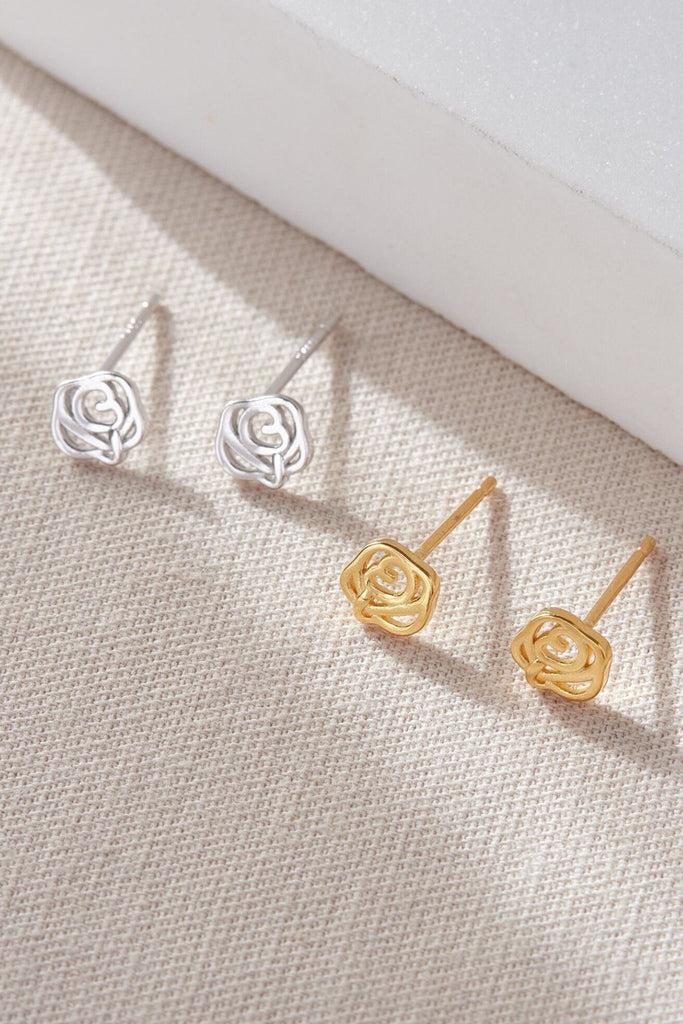 sterling silver openwork studs, designed to look like roses, available in silver or gold plated s925 silver. 