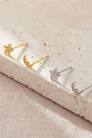 silver and gold hammered stud earrings, each pair consists of one star stud earring and one moon stud earring, available in silver and gold