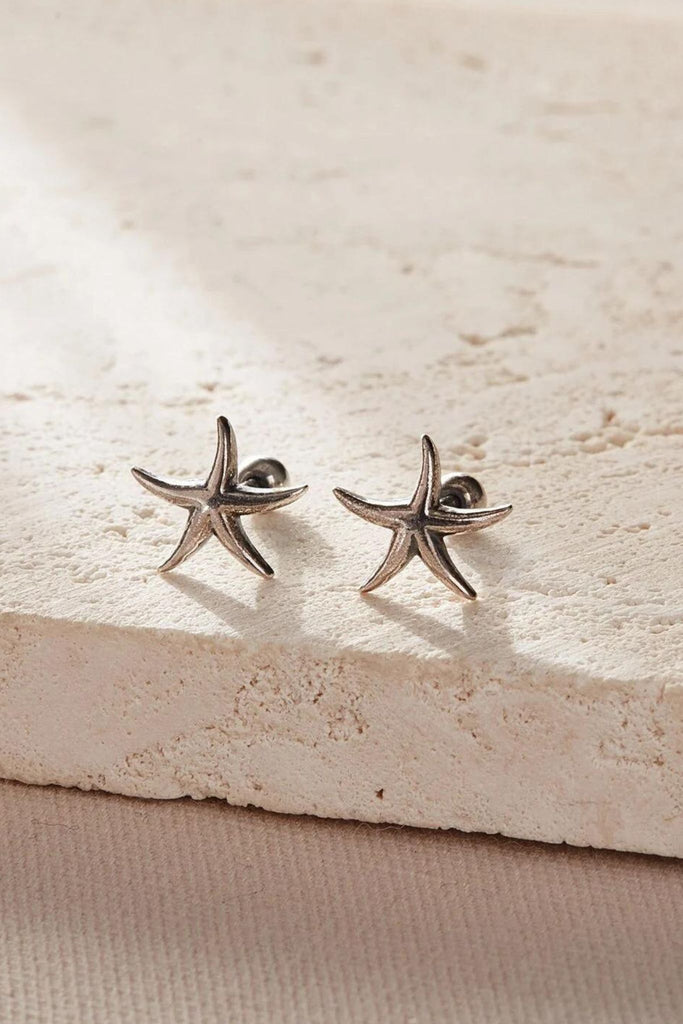 sterling silver starfish cartilage stud earrings with screw on ball back fastenings