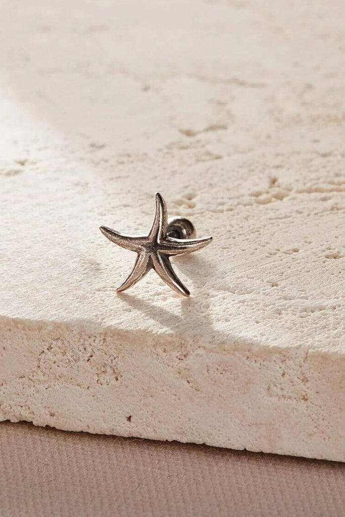showing a single starfish cartilage stud
