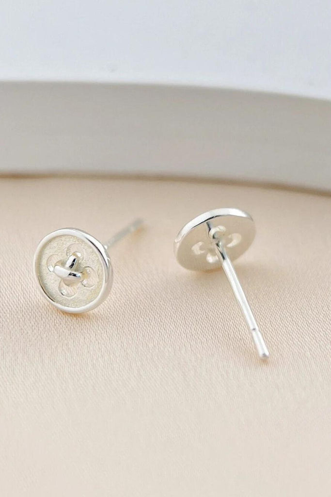 showing the front and back of the button earrings
