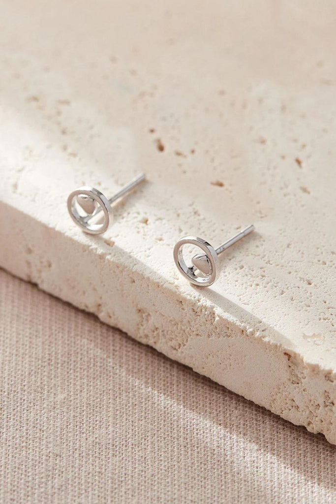 open work sterling silver circle studs with a dainty love heart in the middle