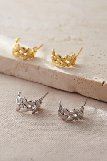 sterling silver olive leaf half hoop earrings with butterfly backs, the earrings are designed to look like an olive vine and and semi-circular, available as silver or gold plated S925 sterling silver