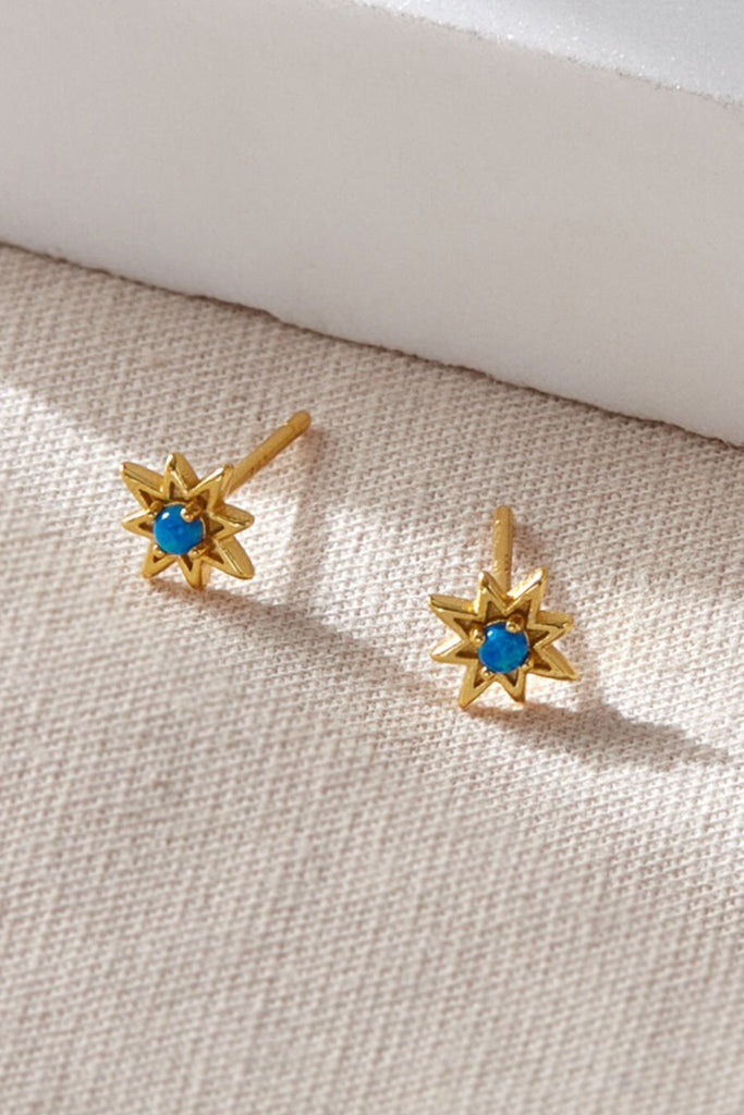 close up of the gold plated silver blue opal stud earrings