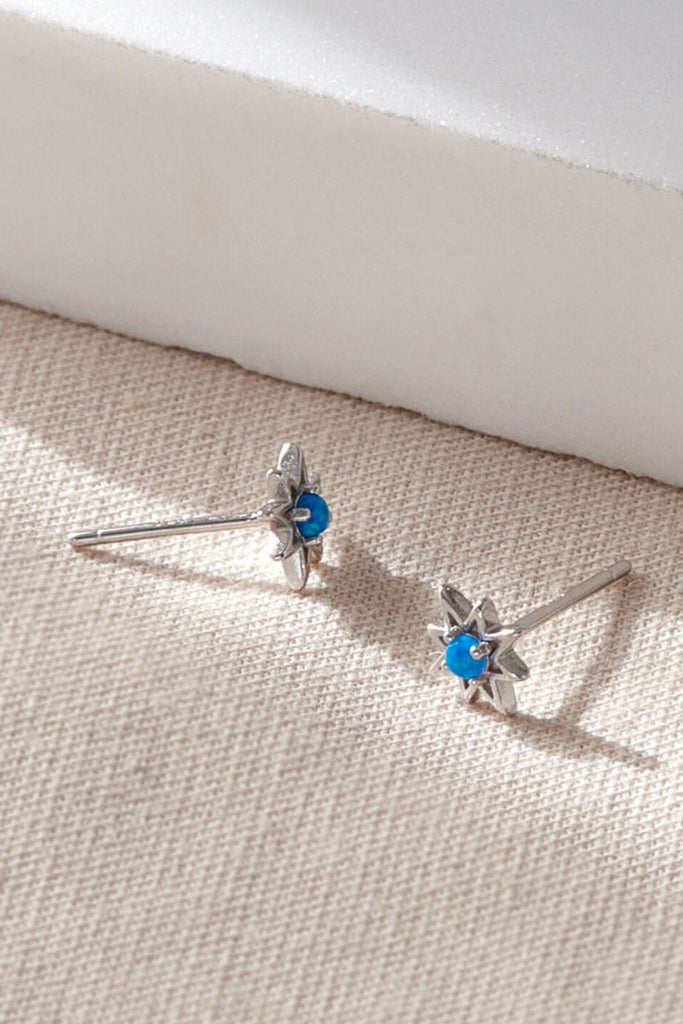 close up of the silver blue opal stud earrings