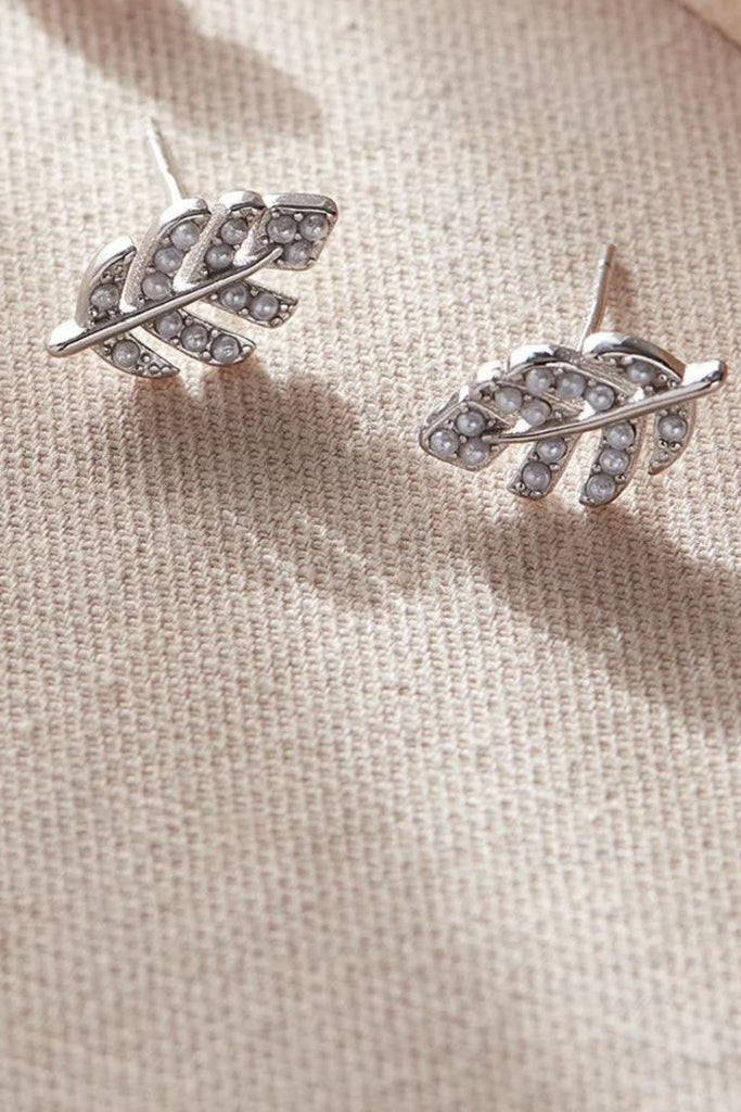 close up of the silver sparkly leaf stud earrings