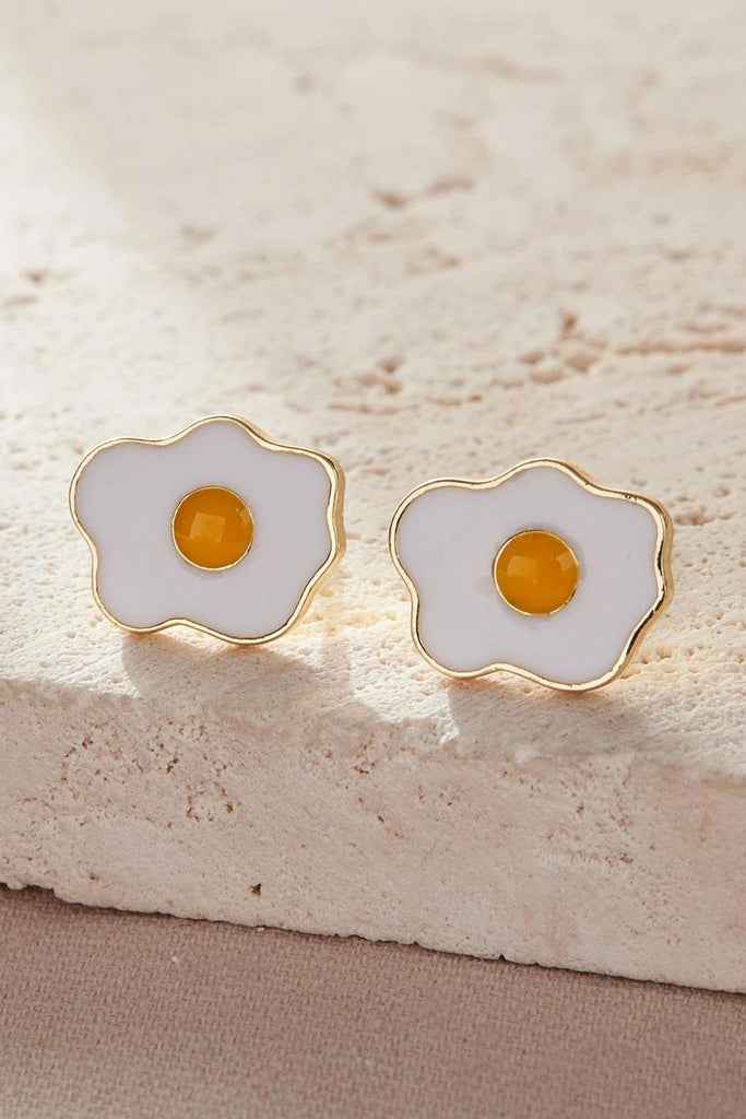 white and yellow fried egg stud earrings set in gold coloured copper, with sterling silver pins