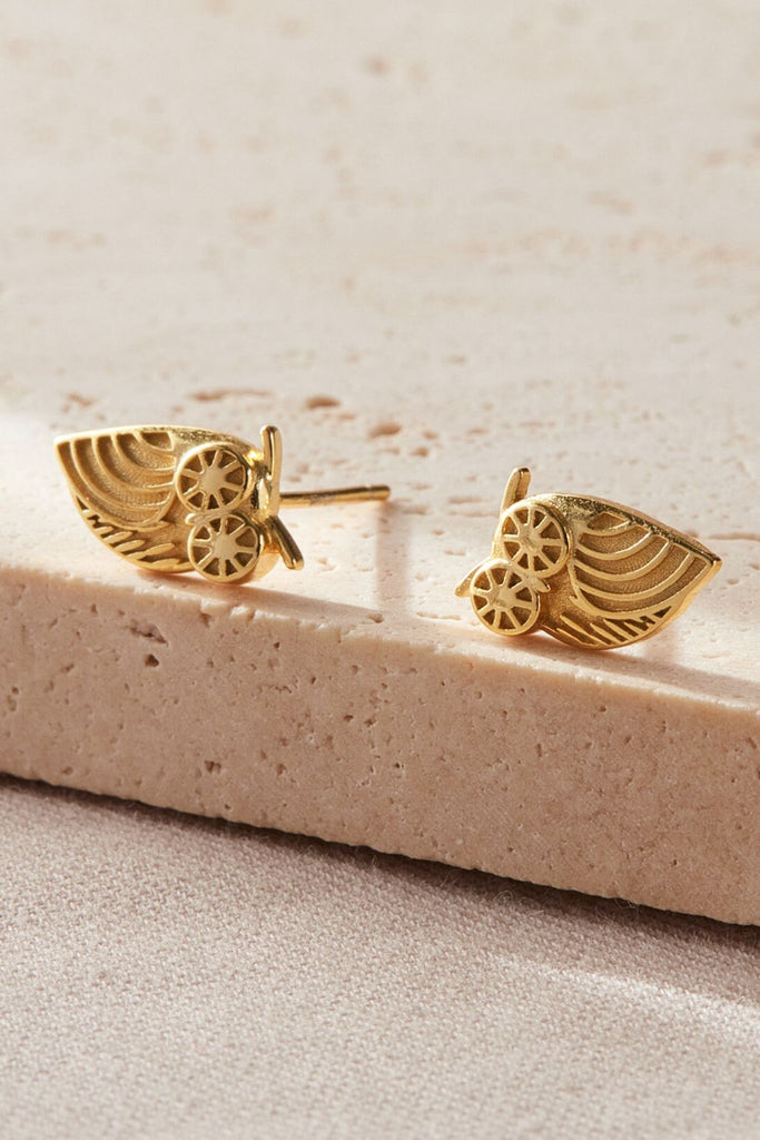 close up of the gold owl stud earrings