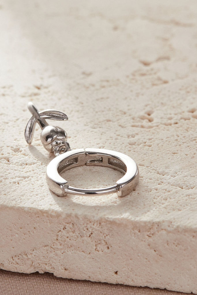 close up of the latch closure of the tulip hoop earrings