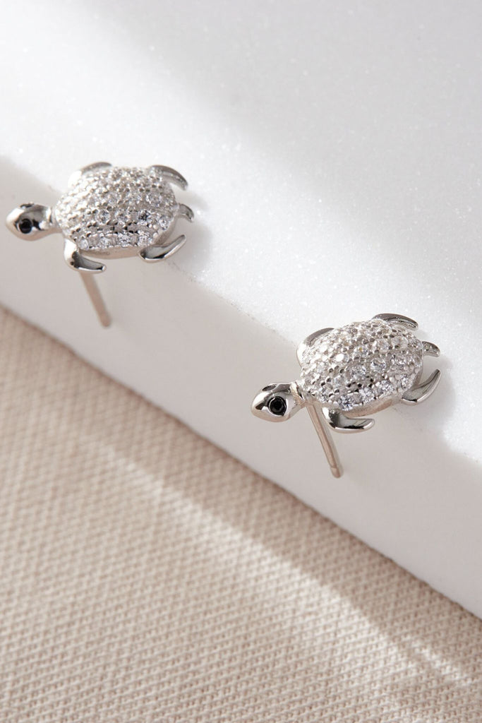 close up of the sparkly cz crystals on the shells of the turtles