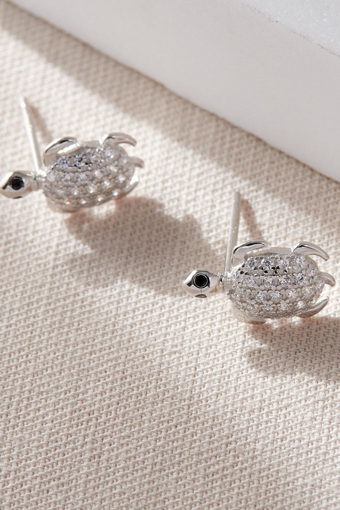 pair of sparkly cz encrusted turtle stud earrings made from s295 sterling silver