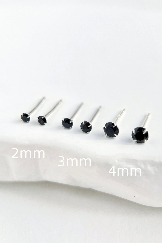 three sizes of round black stud earrings, 2mm, 3mm and 4mm studs all mounted in S999 sterling silver