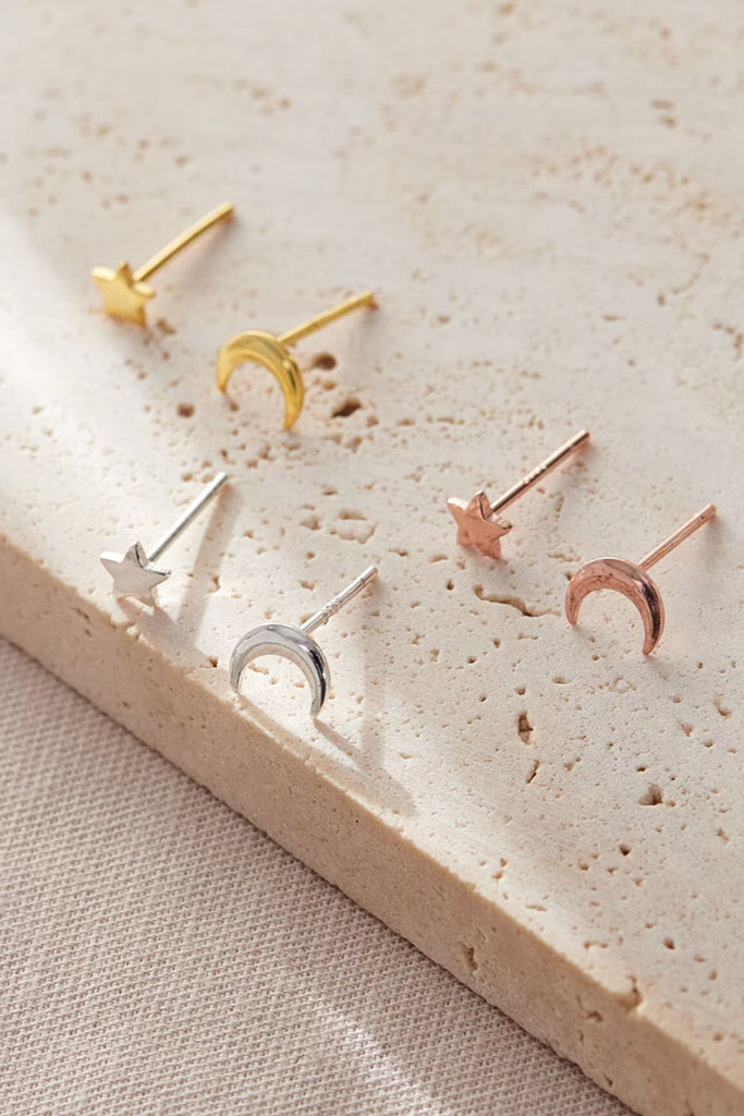 mismatched asymmetric star and moon stud earrings in silver, gold and rose gold. all made from s925 sterling silver